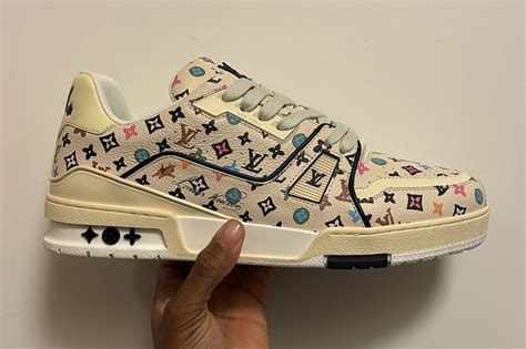 x Tyler the Creator LV Trainer sneakers .